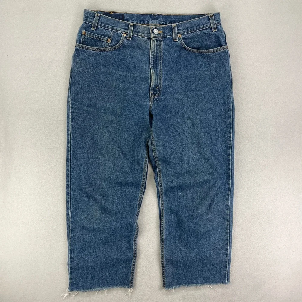 VTG Levi's Jeans 550 Mens 38x32‎ Blue Distressed Denim Relaxed made in USA Cut